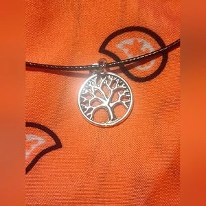 Black cord necklace with tree of life charm